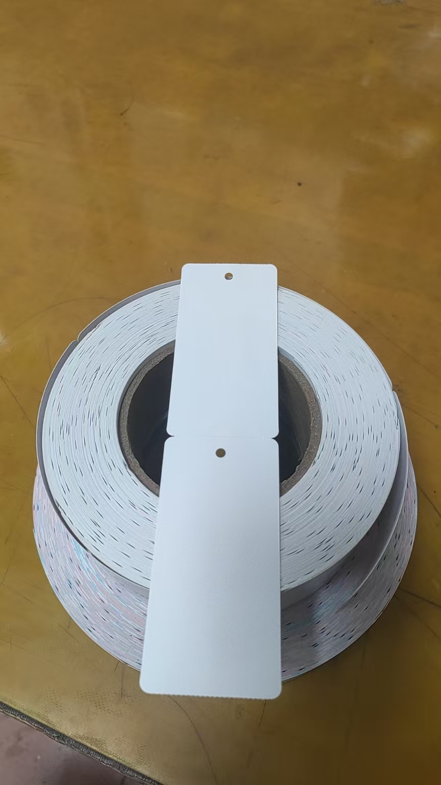 山东烟台吊牌厂家电话_卷装打印吊牌|合格证吊牌价格深度解析